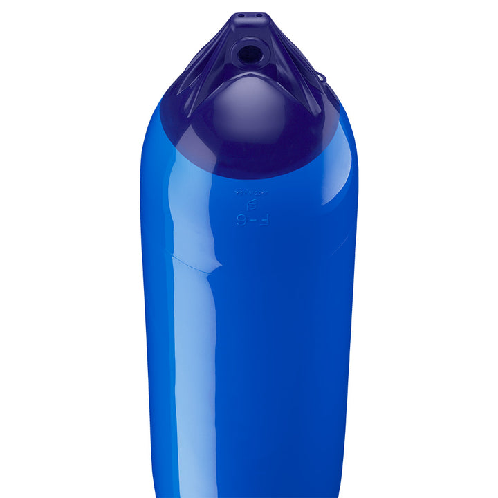 Blue Polyform F-6 Twin Eye Fender, 11 x 42 inches, made by Polyform U.S., shown hanging in a marine setting.