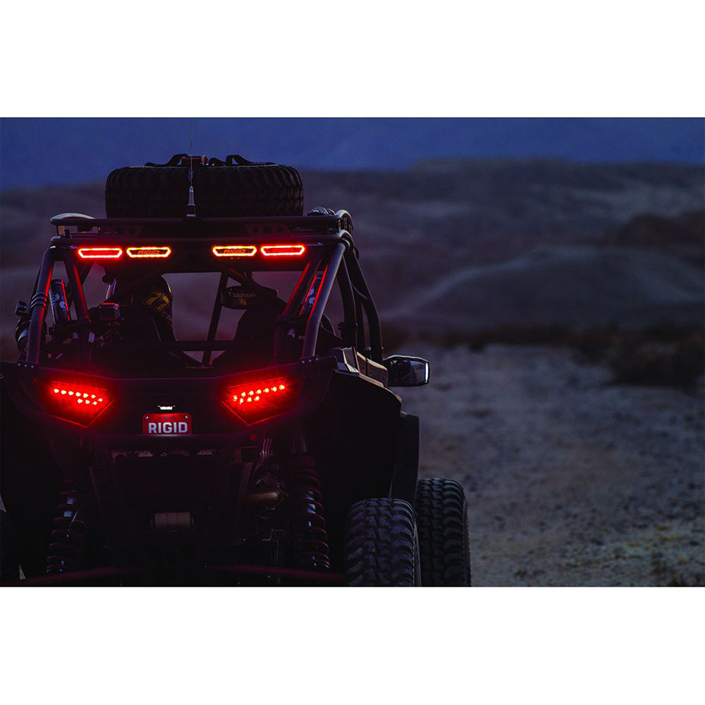 RIGID Industries Chase Red flood and spreader lights mounted on vehicle, showcasing bright red LED illumination.
