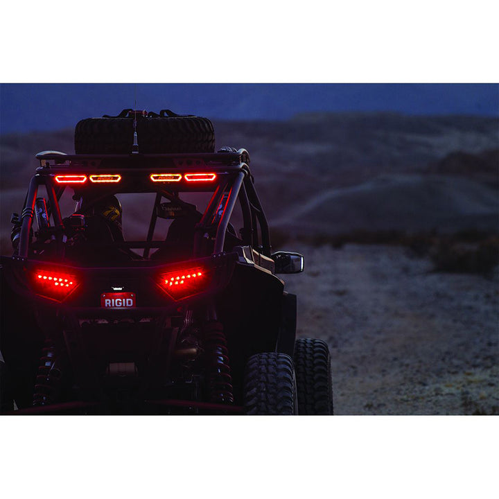 RIGID Industries Chase Red flood and spreader lights mounted on vehicle, showcasing bright red LED illumination.