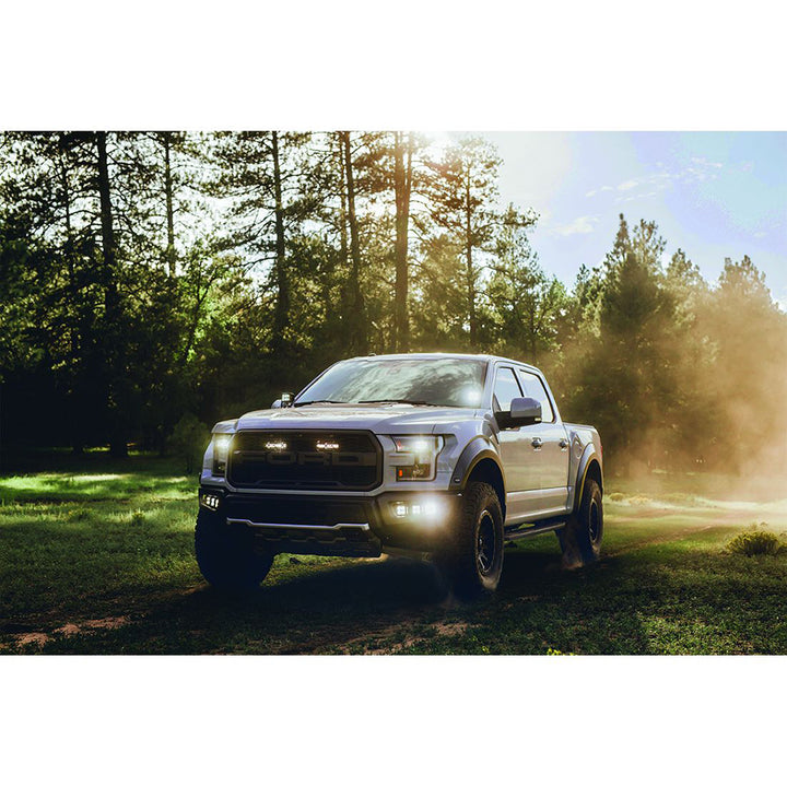 Pair of RIGID Industries D-Series PRO Hybrid-Spot LED flood and spread lights in black, designed for off-road and utility vehicles.