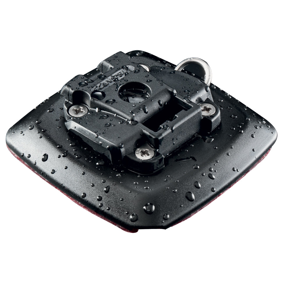 Scanstrut ROKK Mini self-adhesive surface mount display mount attached to a surface, designed for secure device installation.