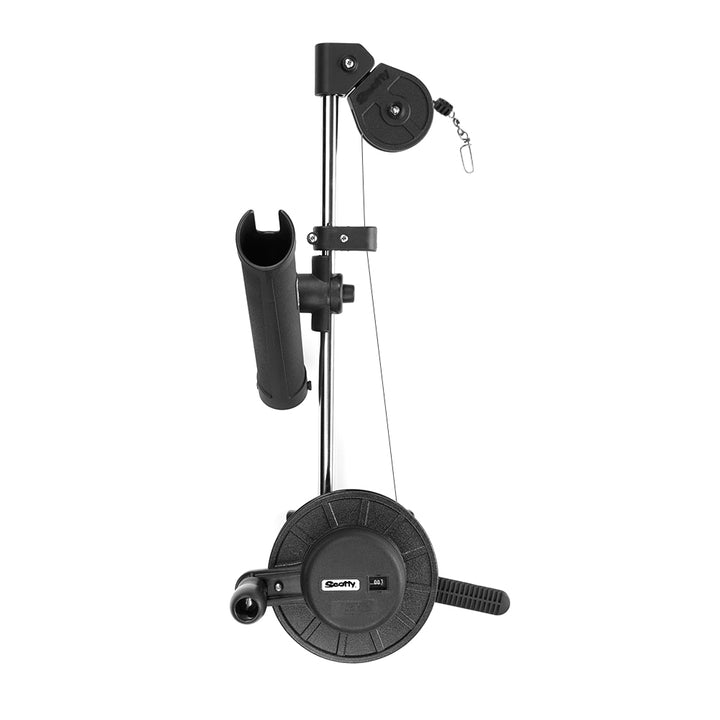 Scotty 1050 Depthmaster Compact Manual Downrigger mounted on boat, with reel and cable for fishing depth control.