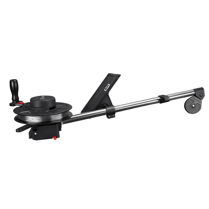 Scotty 1085 Strongarm 30-inch manual downrigger with rod holder for fishing, mounted on boat deck