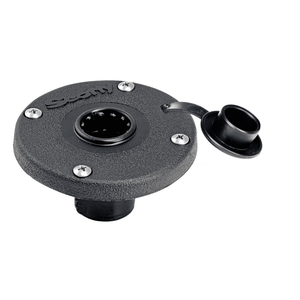 Scotty 344 Round Flush Deck Mount Rod Holder installed on boat deck, designed for secure fishing rod storage.