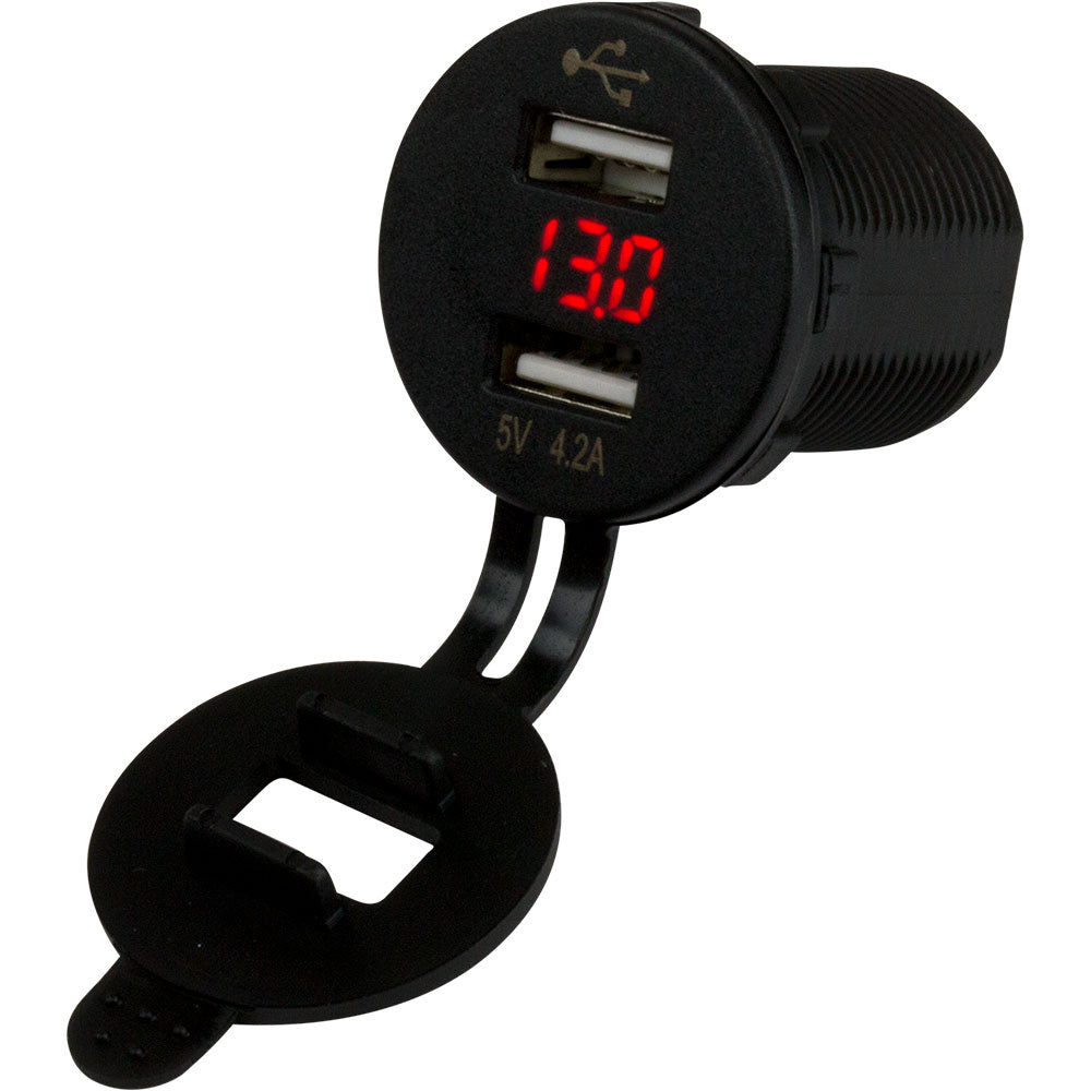 Sea-Dog dual USB socket and voltmeter accessory with hidden display, mounted on a vehicle interior or marine dashboard.