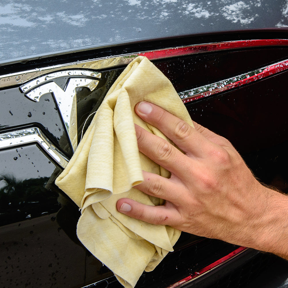 Shurhold PVA cleaning towel draped over a surface, demonstrating its absorbent and durable material for cleaning tasks.