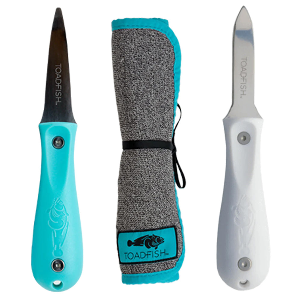 Toadfish Shuckers Bundle with Put Em Back oyster knife, professional oyster knife, and cut-proof shucking cloth on a deck or galley setting.