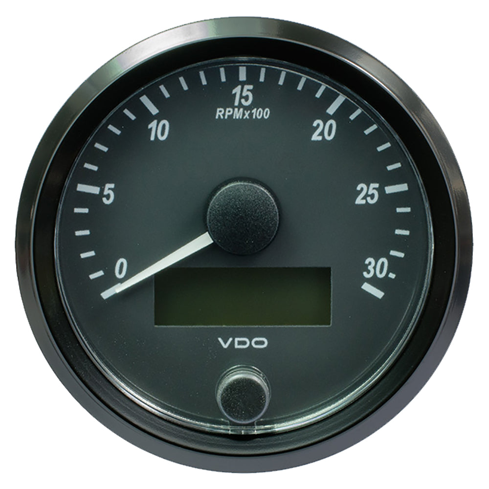 VDO SingleViu 80mm tachometer gauge showing 3000 RPM, mounted in a vehicle dashboard for engine RPM measurement.