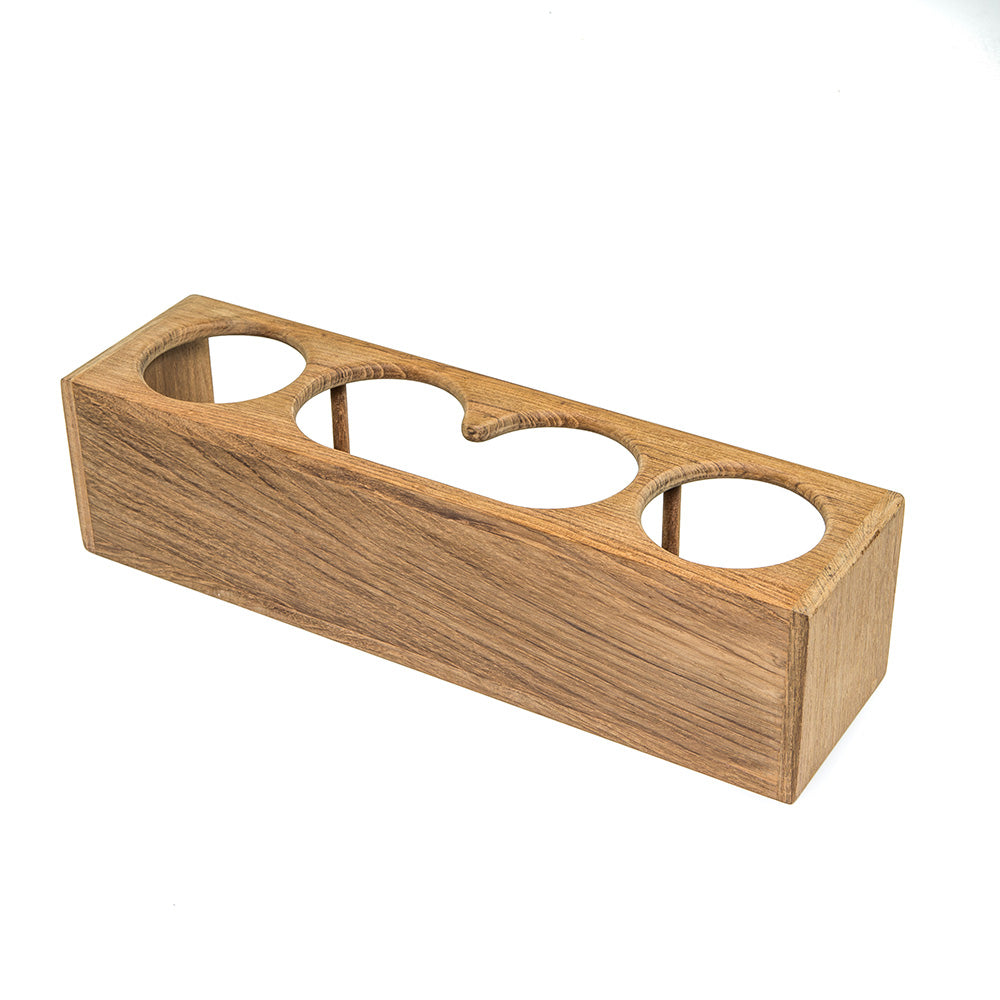 Whitecap teak four-drink and binocular rack, natural wood finish, designed for boat or outdoor use, mounted on a boat or dock setting