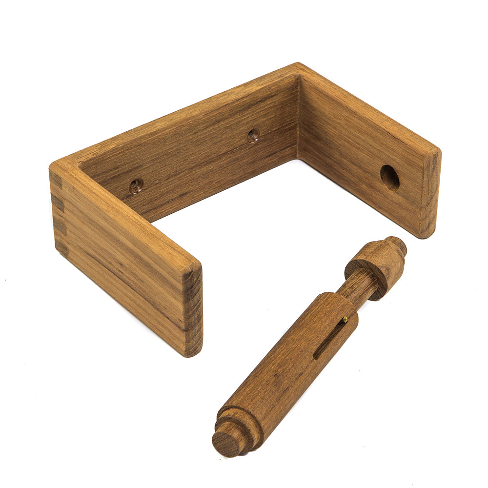 Whitecap teak toilet tissue rack mounted on bathroom wall, featuring a sleek design and storage for toilet paper rolls.